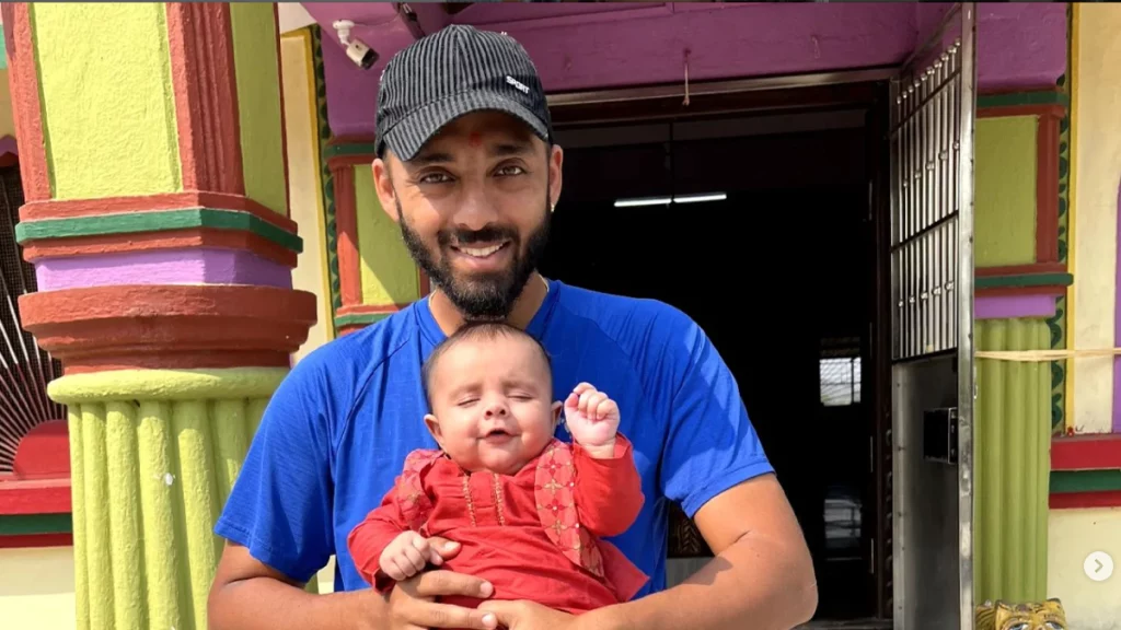 Varun Chakravarthy with his son
