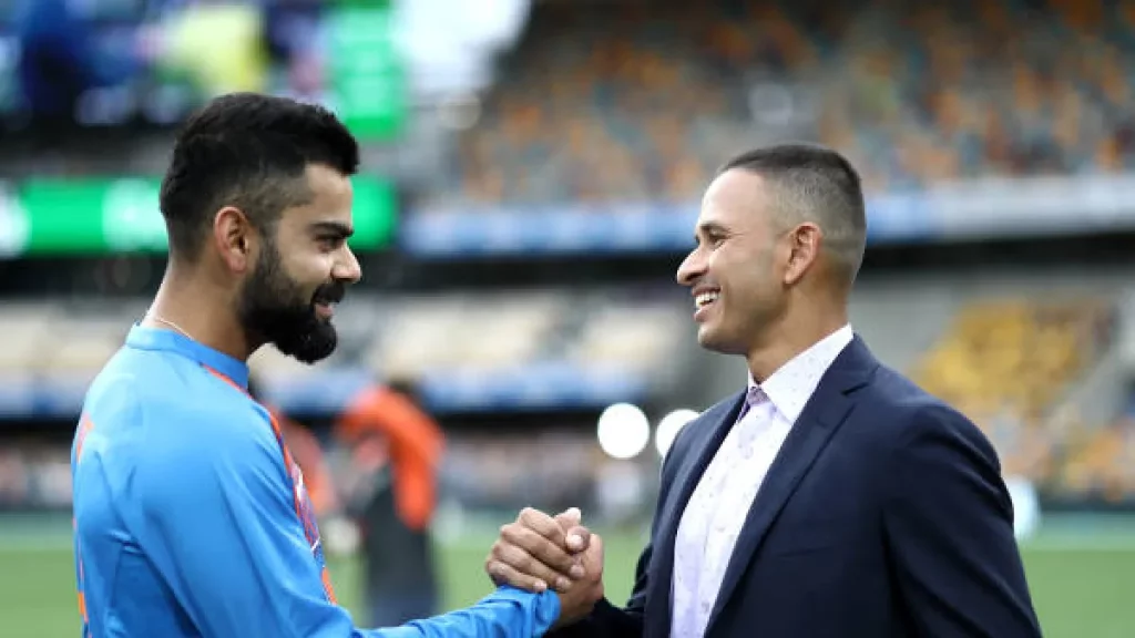 Usman Khawaja and Virat Kohli