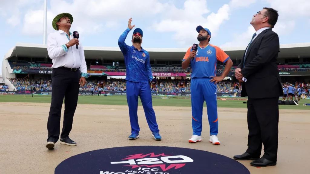 Rohit Sharma and Rashid Khan at the toss